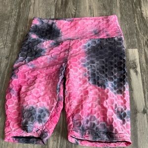 Black and pink, scrunched in the butt area,